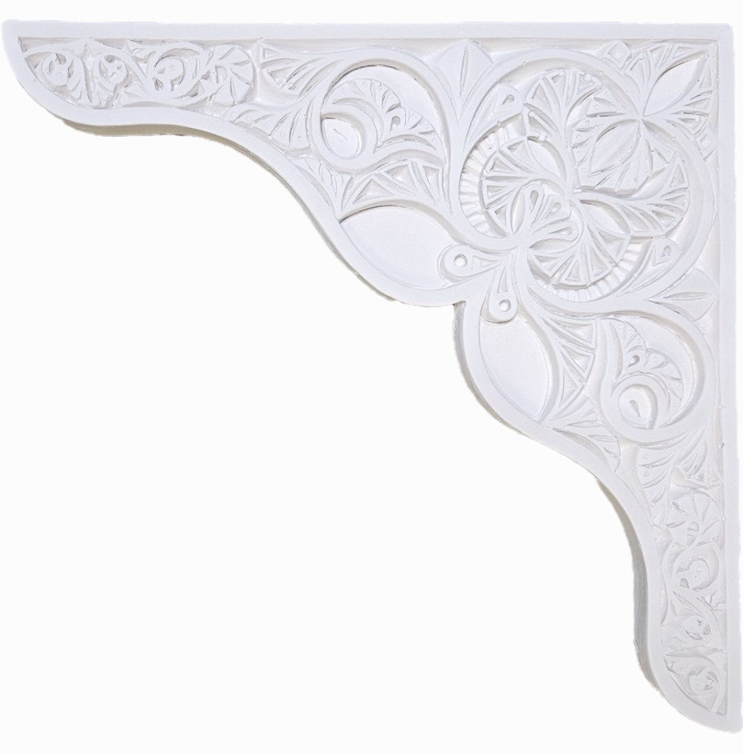 Stucco mihrab-style niche with hand-carved Islamic details