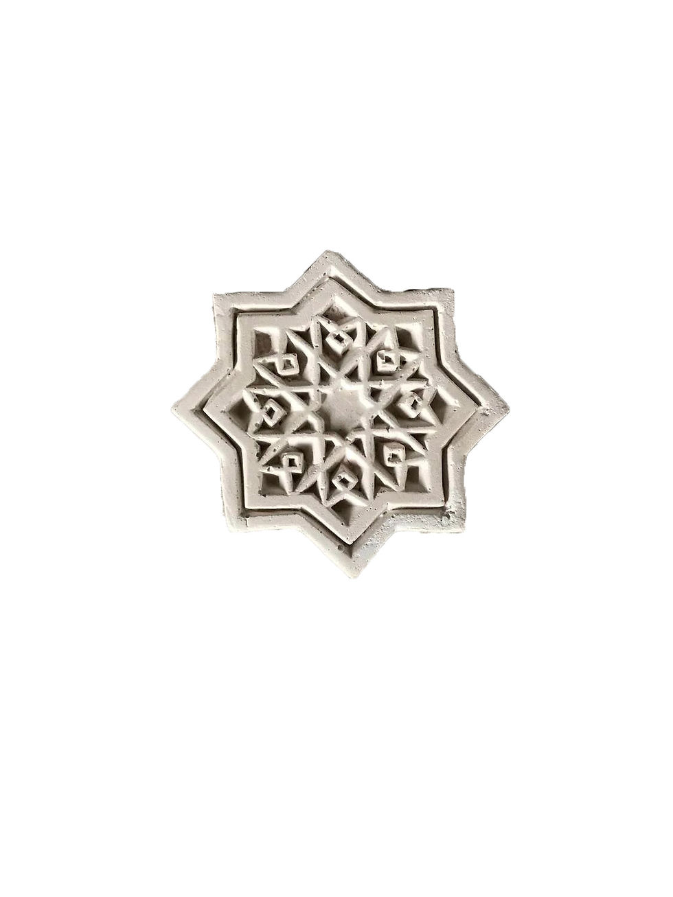 Hand-applied stucco carving with intricate Islamic geometric motifs