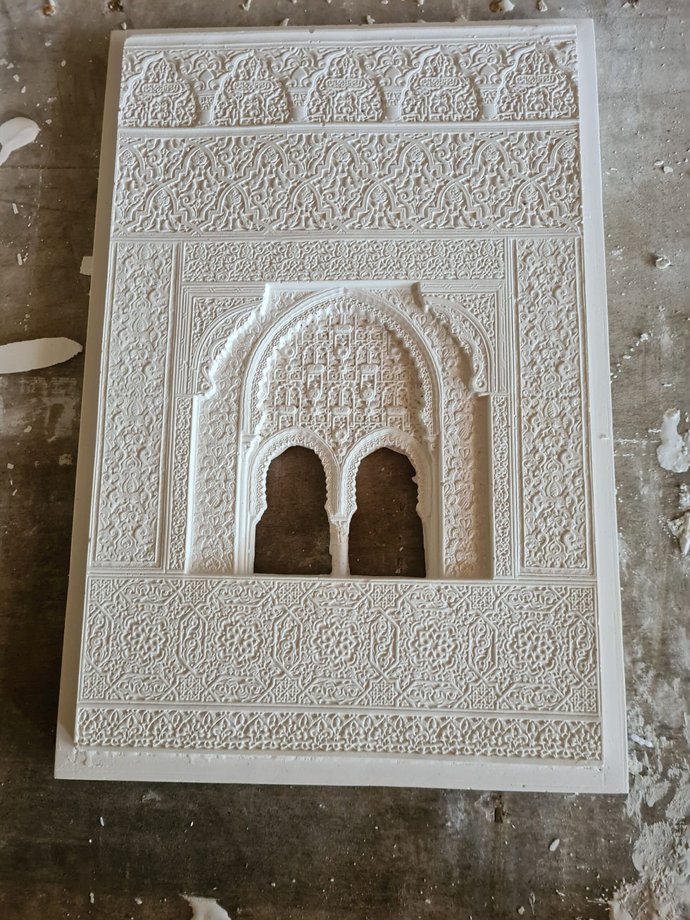 Thumbnail: Decorative Islamic stucco arch with carved muqarnas and arabesque motifs