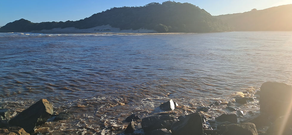 Brown flooded Qwaninga river (Kob Inn)