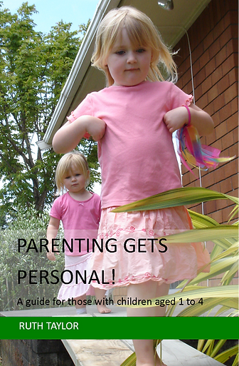 Two girls dressed in pink walking towards the camera.
