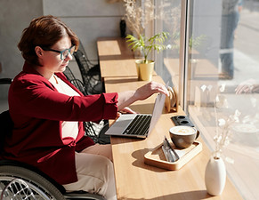 Support worker assisting a participant with daily living activities at home
