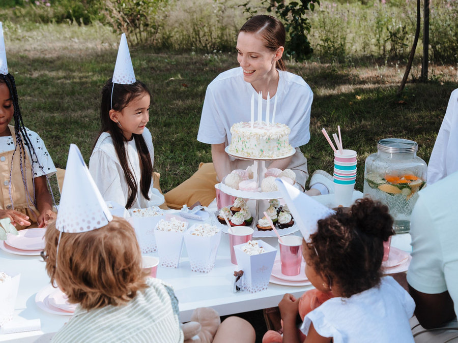 Children seated around a party table