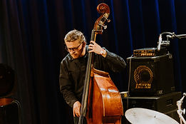 Toby, guitar and bass teacher at Inspired Playing , performing on the bass