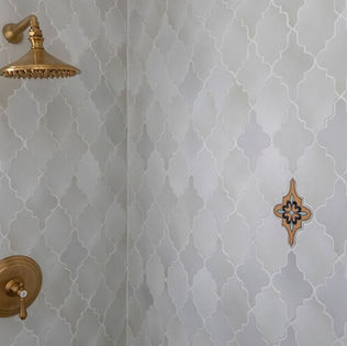 shower with grey ceramic tiles 