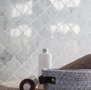 bathroom wall with marble arabesque marble  mosaic tiles 