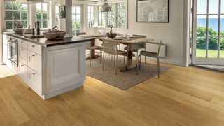 Kitchen with brown engineered wood floors
