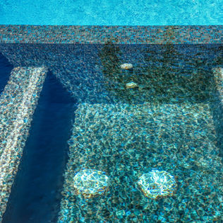 spa with teal glass mosaic 