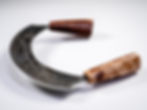 Hand Forged Pizza Cutter from truck spring - side angle