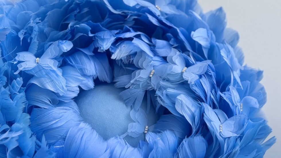 Blue butterfly feather hat by Lisa von Hallwyl Millinery
