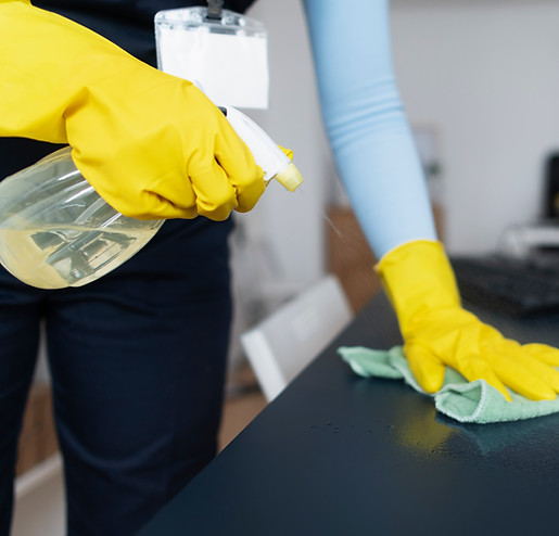 person-taking-care-office-cleaning