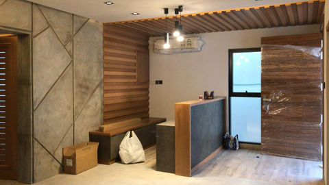 01a reception area after renovation- industrial commercial design- concrete wall design - customised office furniture - brick wall - wood cladding.jpeg