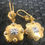 Thumbnail: Peony Flower Drop Earrings with Diamonds (0.22 ct) in 18k Yellow Gold