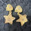 Thumbnail: Trillium Flower & Star Drop Earrings in 18k Yellow Gold 