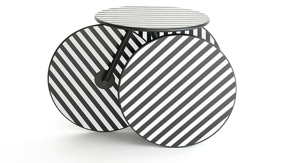 Rolly Table by Mike & Maaike with oversized circular birch legs and round tabletop