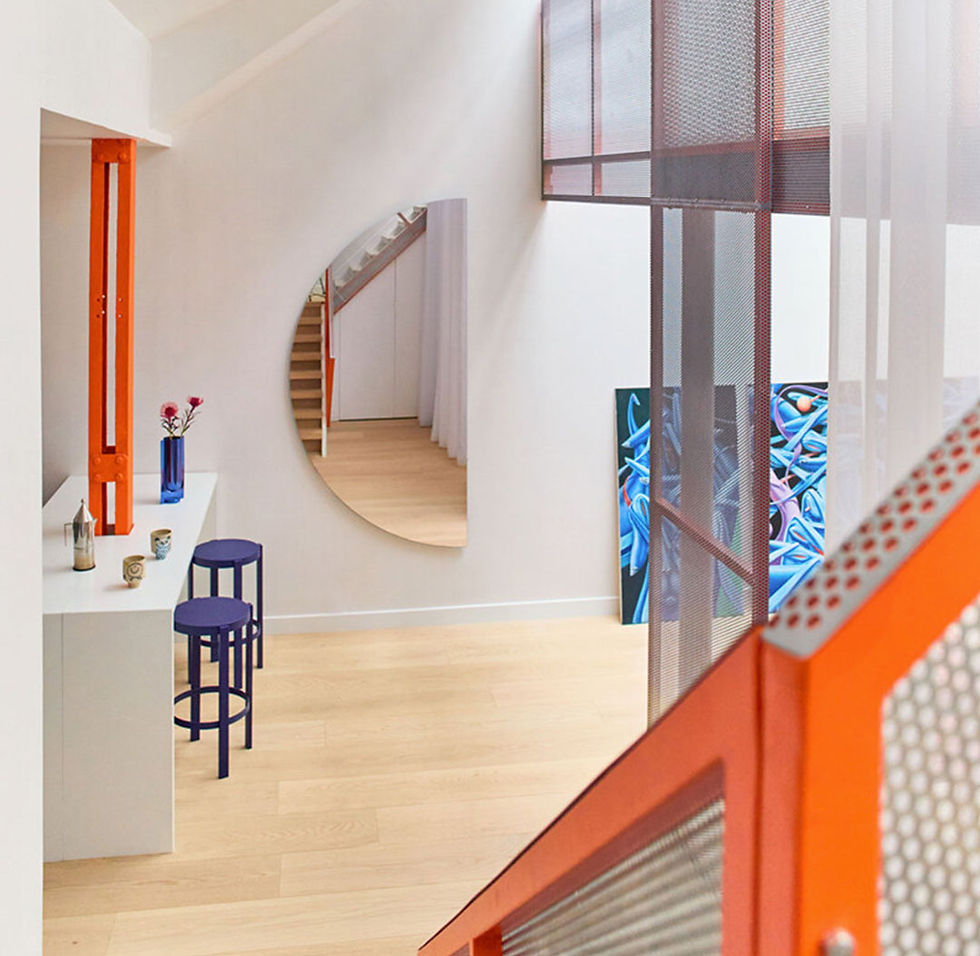 Gambey Paris Apartment: PAF Atelier and BB Architectes Redefine Space with a Perforated Mezzanine