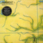 Brian Eno – Ambient 1: Music for Airports (1978) vinyl - Yellow and green abstract map-like cover with text "Ambient 1: Music for Airports, Brian Eno." Includes circular label detailing album specs.