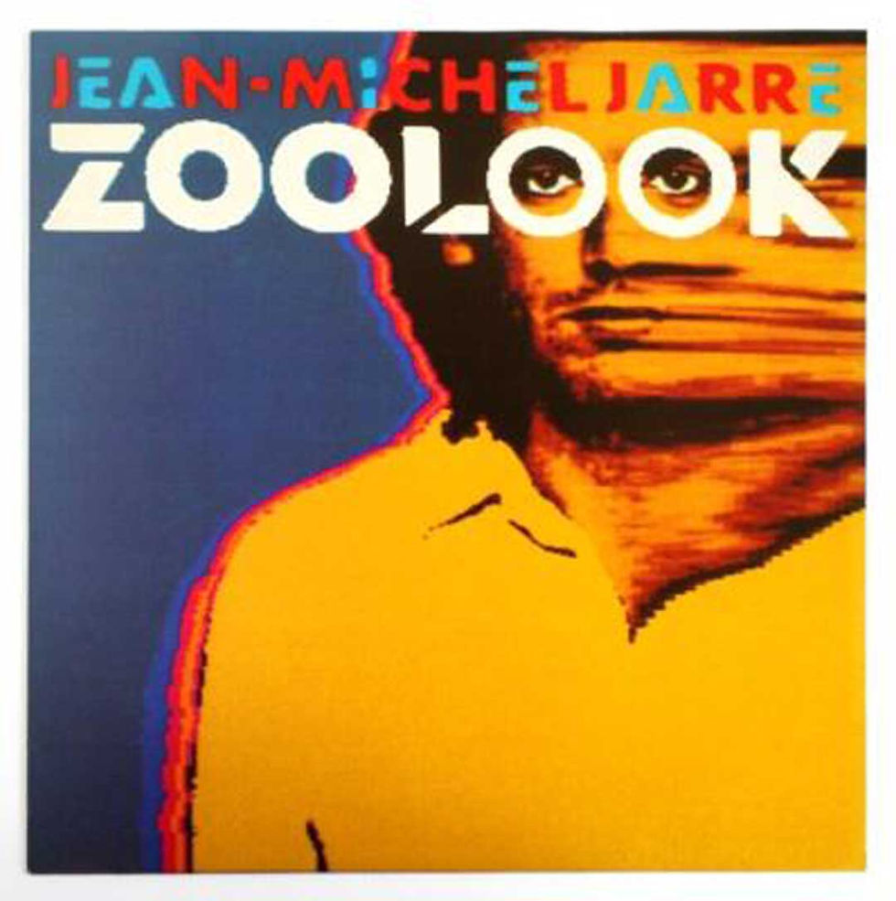 Album cover of Jean-Michel Jarre’s Zoolook, showing a stylized orange face against a blue background with bold title text.