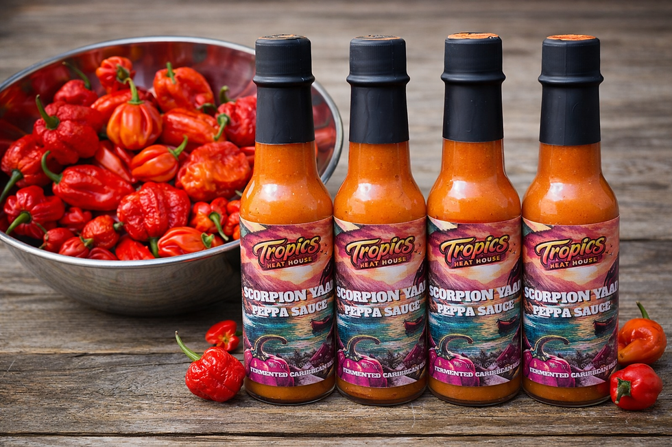 Four Tropics Heat House brand hot sauce bottles and red peppers