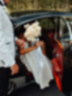 Bride getting out of car 2.jpg