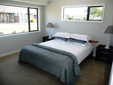 Double bed inside one of the village houses