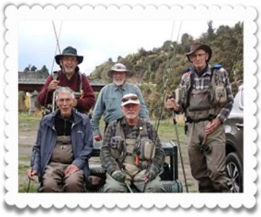 Maurice with group photo.jpg