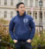 Firefighter Ben Chou standing in front of City Hall