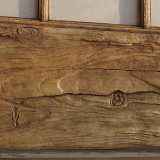 Cement render, hand carved and painted