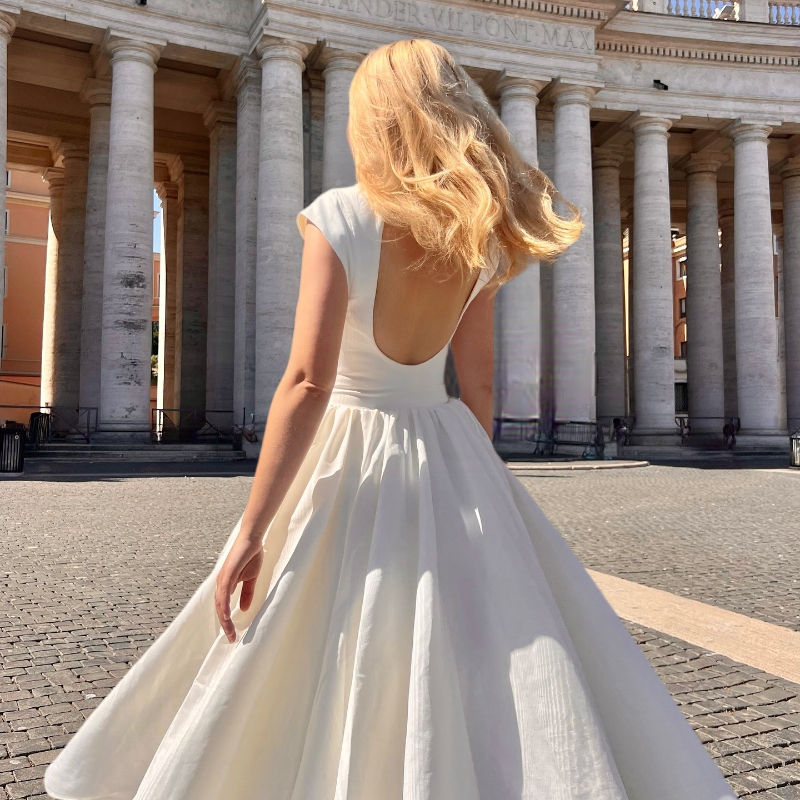 Thumbnail: Cut-Out Back Midi Dress with Structured Silhouette

