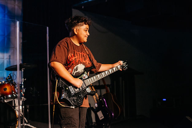 Isaac Playing Guitar.jpg