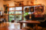 the inside of a restaurant with floor seats