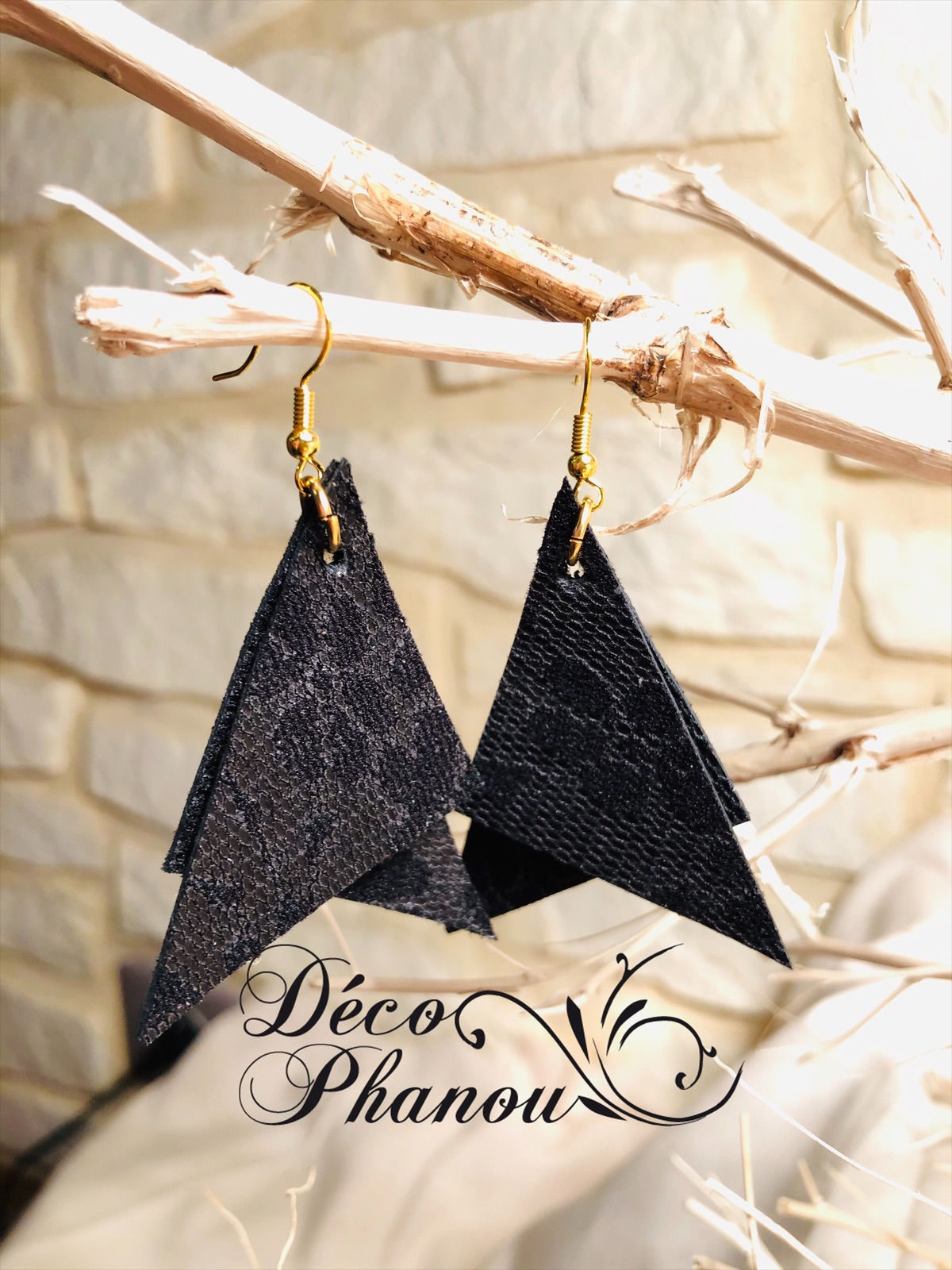 BOUCLES D'OREILLES EN CUIR ASYMETRIQUES