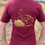Thumbnail: GLG Red Fleck Tee with Gold Logo and brand in Unisex Crew or ladies v-neck