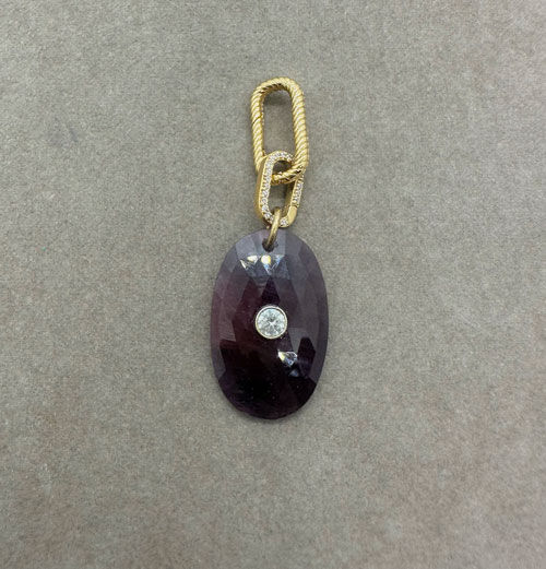 Sapphire pendant charm set with natural zircon