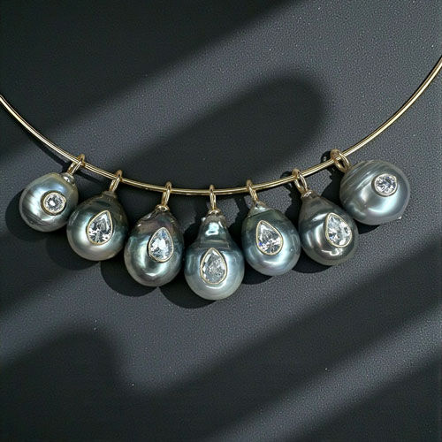 Miniature : Pendentif perle de Tahiti sertie d'une topaze bleue