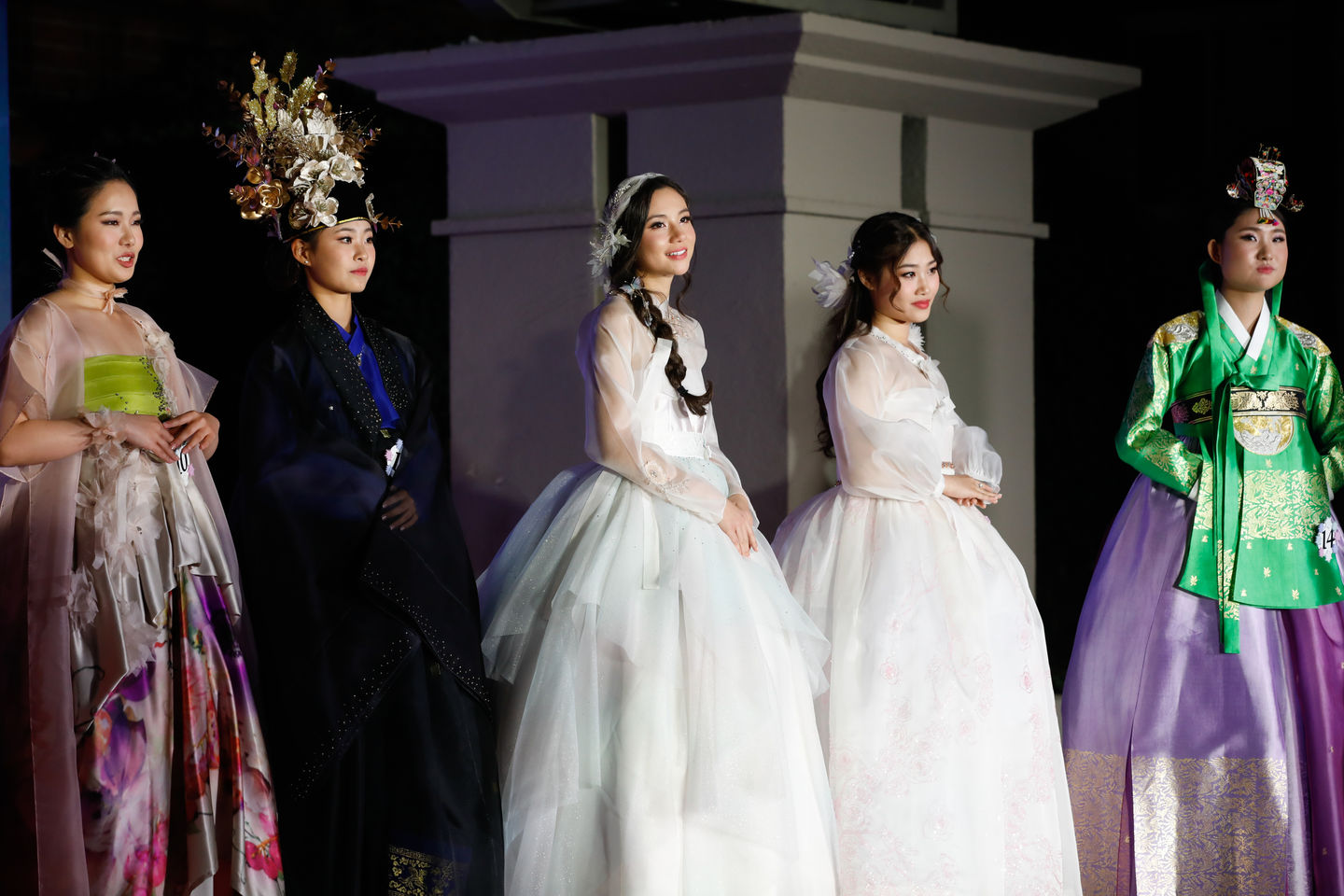 2024 HI-TEEN USA®. CONTESTANTS ON STAGE WAITING FOR THE Q&A PORTION OF THE COMPETITION IN THEIR TRADITIONAL KOREAN ATTIRE