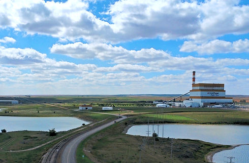 Power plant building with lakes and a road