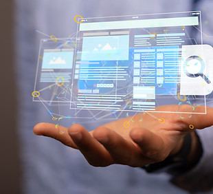 AdobeStock_412970275.(Web application in hand)jpeg.jpeg