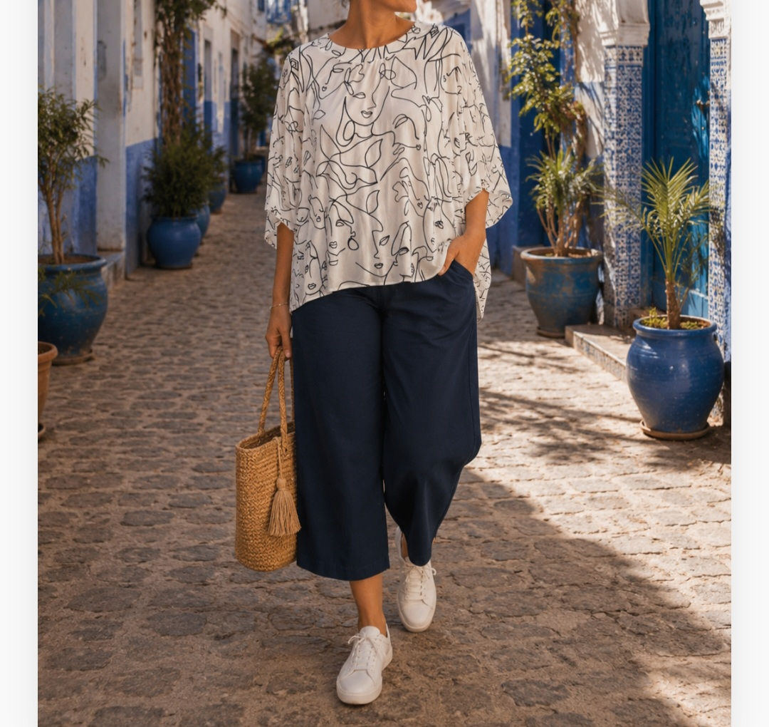 Blouse blanche à imprimés graphiques noirs