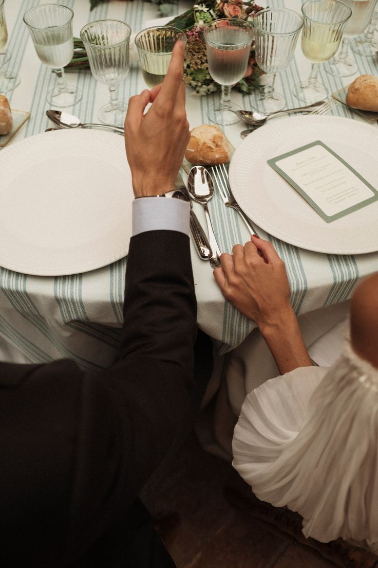 couple enjoying a wedding breakfast with a delightful table setting