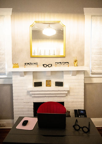 Sims OD optical boutique building in Tampa, Florida, featuring modern glass windows and stylish storefront.