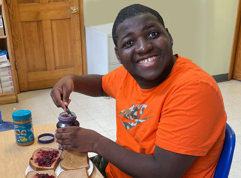 Individual at Club Cool Making Lunch