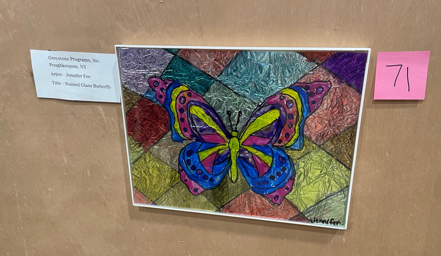 Stained Glass Butterfly Created by Jennifer, an individual Greystone Programs supports, is showcased at the NY Alliance Art Show.