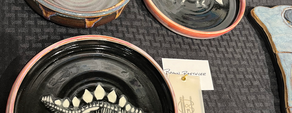 Third Place, Wheel Thrown Pottery: Brynn Roethlers, Dinosaur Plates