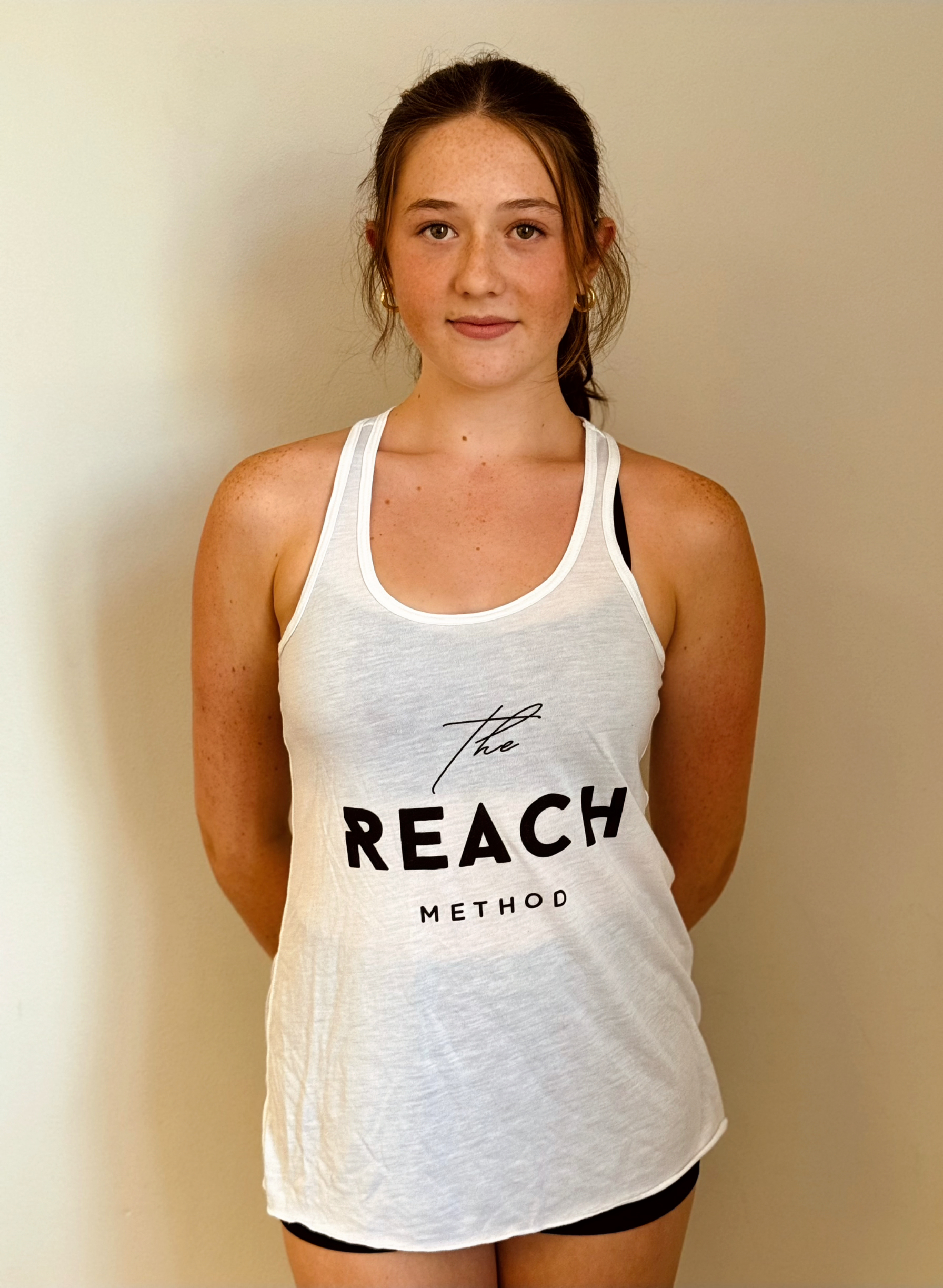 The Reach Method Racerback Tank