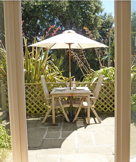Boathouse Kingsbridge terrace with table chairs BBQ