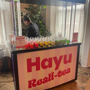 Hayu Reali-tea branded bubble tea cart served by Mini Melts Events at a corporate brand activation