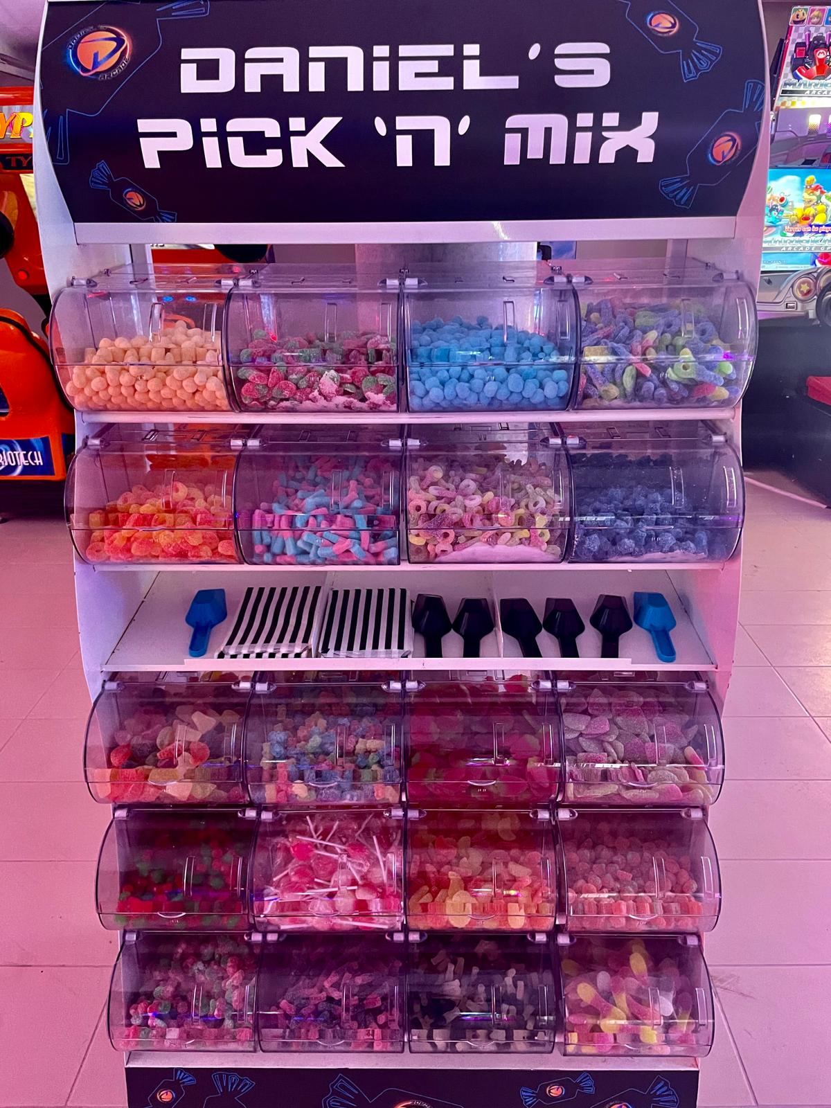 Pick n mix cart for corporate events with colourful branded fun food display