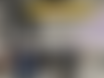 Group of 6 open house attendees standing in factory next to ER expasion project for Beth Israel Milton