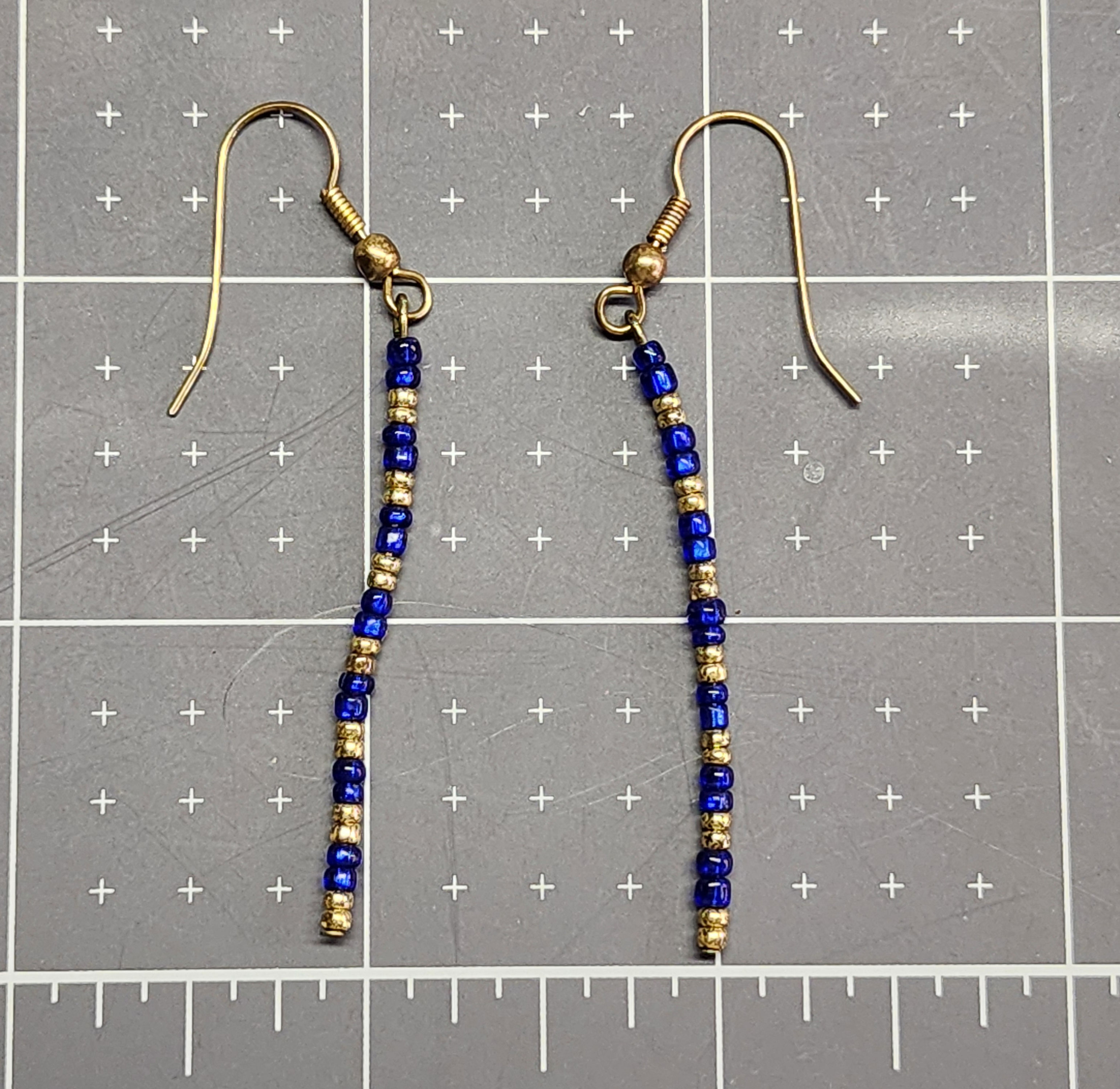 Sead bead earrings, blue and gold